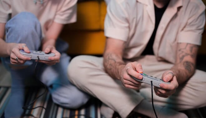 A man and a woman playing video games