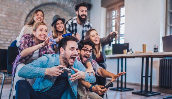 Friends having fun while playing a video game